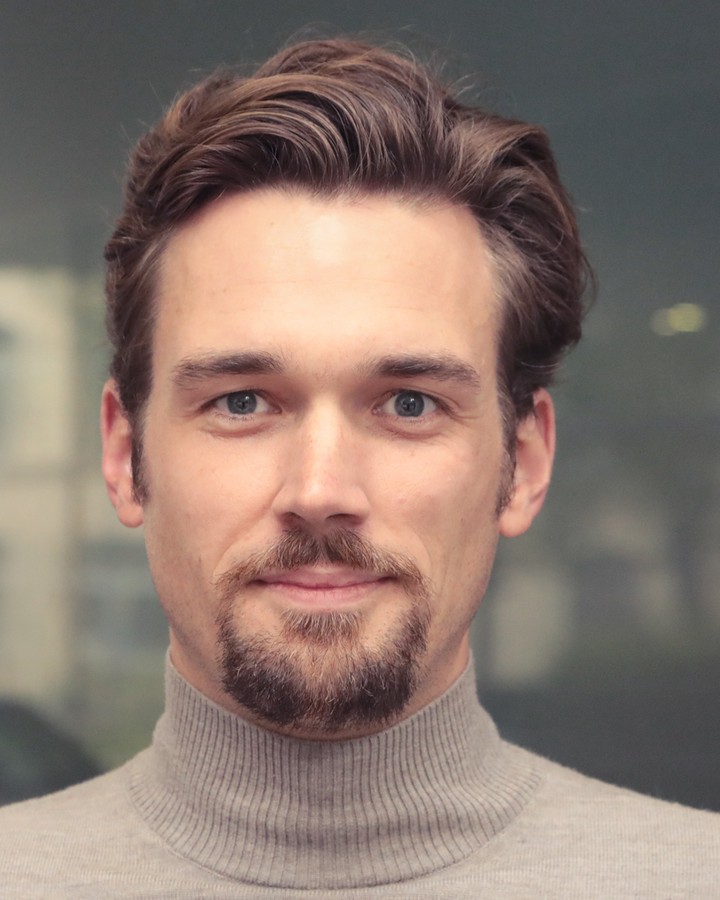 K. Jonathan Klüser